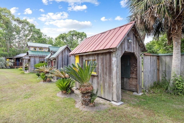 view of shed with fence