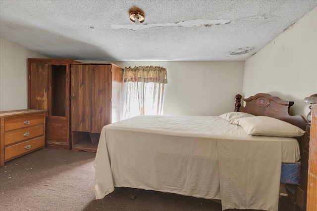 143 Washington Ave, Havana, FL 32333 - bedroom with dark colored carpet and a textured ceiling
