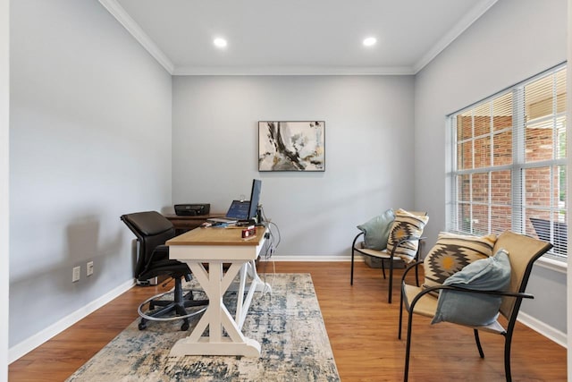 office featuring crown molding, baseboards, and wood finished floors