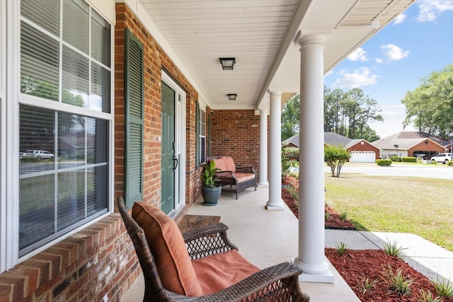 view of patio featuring a porch and entry steps