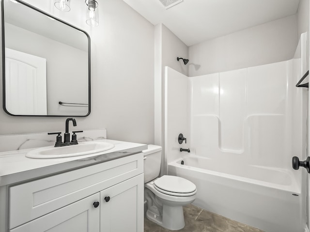 65 Sioux Trl, Crawfordville, FL 32327 - bathroom featuring toilet, vanity, and shower / washtub combination