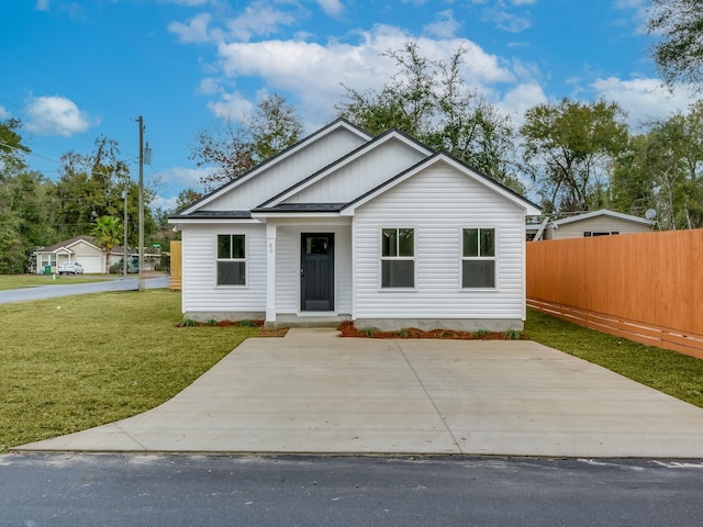 65 Sioux Trl, Crawfordville, FL 32327 - view of front of home featuring board and batten siding