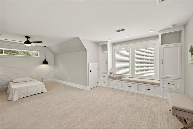 4640 Grove Park Dr, Tallahassee, FL 32311 - unfurnished room featuring light colored carpet, a ceiling fan, lofted ceiling, and wood walls