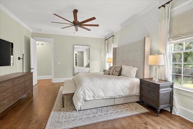 4640 Grove Park Dr, Tallahassee, FL 32311 - bedroom with wood finished floors, ornamental molding, and ceiling fan