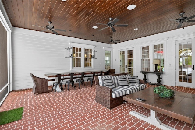 4640 Grove Park Dr, Tallahassee, FL 32311 - view of patio featuring ceiling fan, outdoor dining area, and french doors