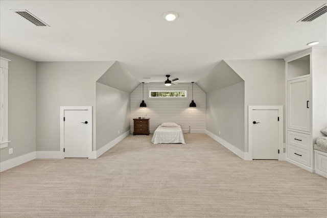 4640 Grove Park Dr, Tallahassee, FL 32311 - unfurnished bedroom with lofted ceiling, light carpet, and a ceiling fan