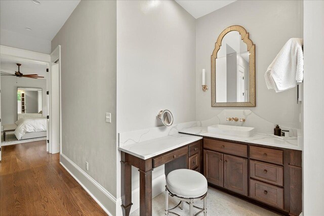 4640 Grove Park Dr, Tallahassee, FL 32311 - bathroom featuring wood finished floors, vanity, ensuite bathroom, and ceiling fan