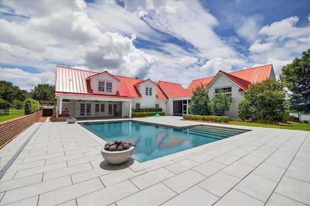 4640 Grove Park Dr, Tallahassee, FL 32311 - swimming pool featuring a patio and french doors