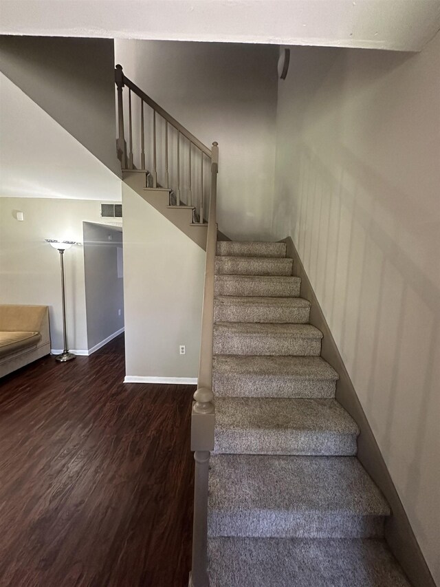214 Belmont Rd, Tallahassee, FL 32301 - stairway featuring wood finished floors and baseboards