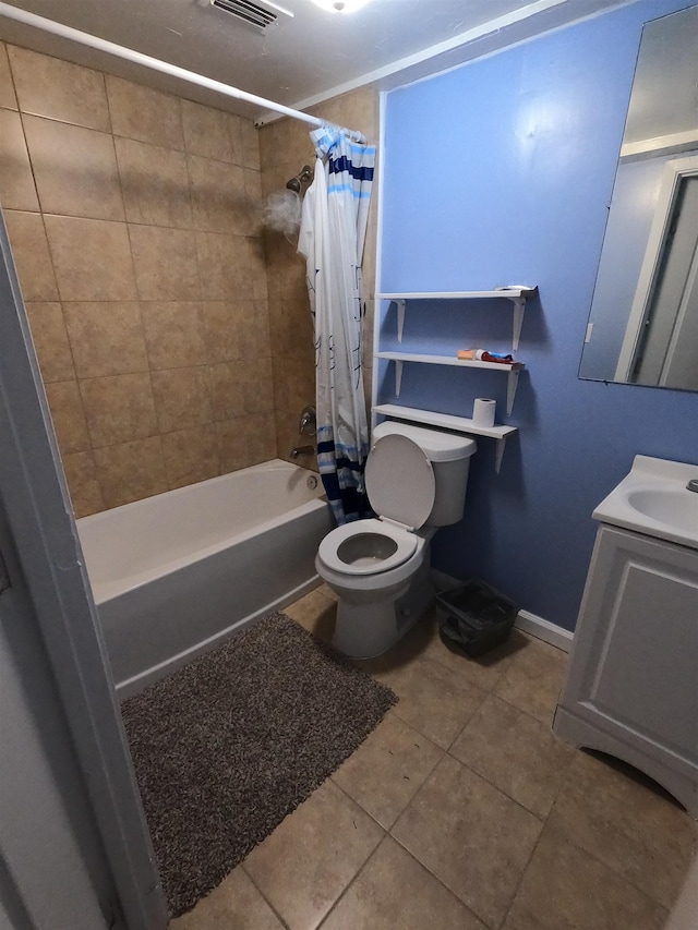 full bathroom featuring shower / tub combo, vanity, tile patterned floors, and toilet