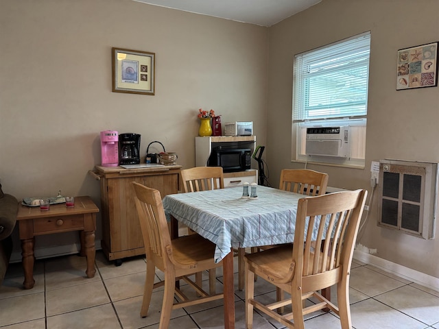 tiled dining room featuring cooling unit