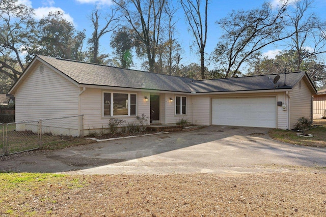 single story home with a garage