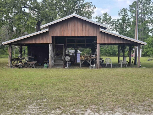 3232 Loren Henderson Rd, Perry, FL 32347 - view of pole building with a lawn