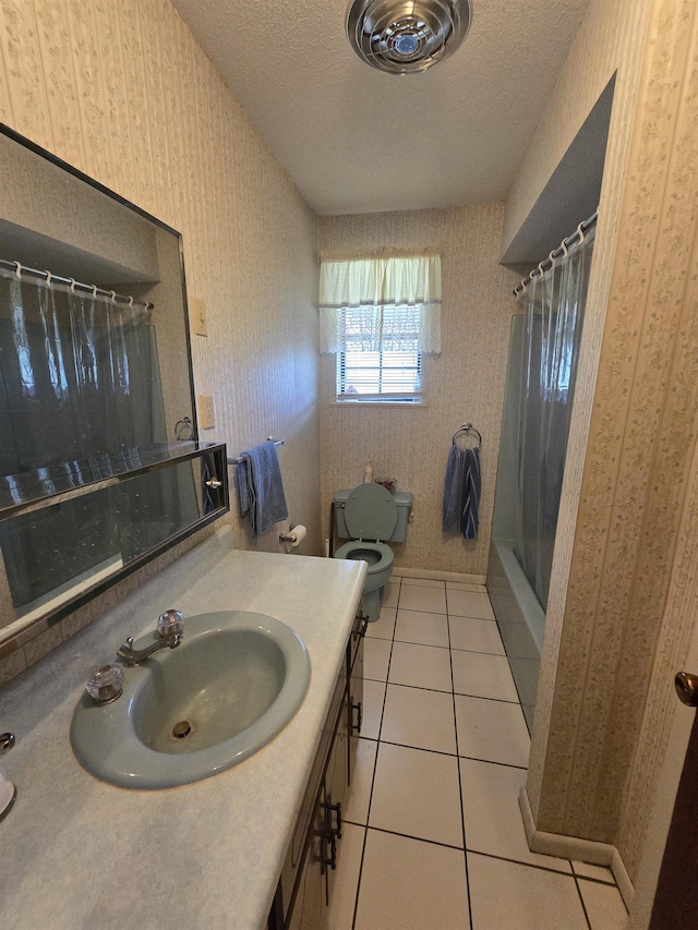 3232 Loren Henderson Rd, Perry, FL 32347 - bathroom featuring tile patterned flooring, wallpapered walls, a shower with shower curtain, toilet, and vanity
