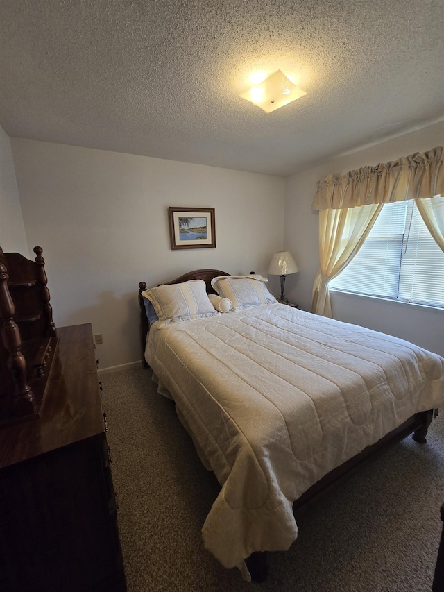 3232 Loren Henderson Rd, Perry, FL 32347 - carpeted bedroom with a textured ceiling