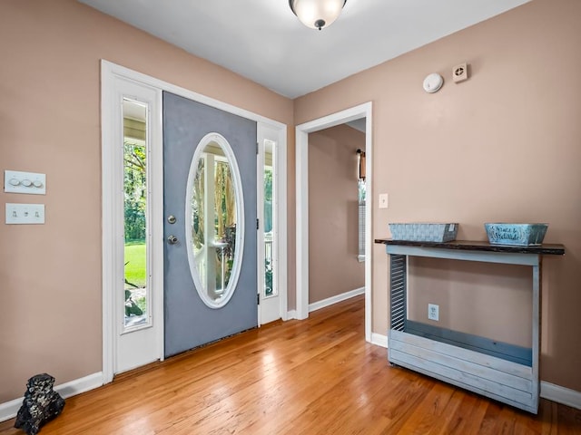 foyer with light wood-type flooring