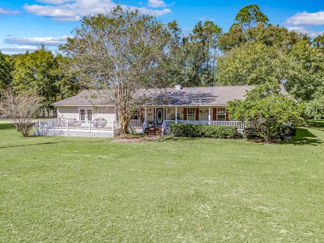 ranch-style home with a porch and a front lawn