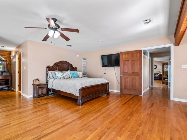 bedroom featuring light hardwood / wood-style floors and ceiling fan