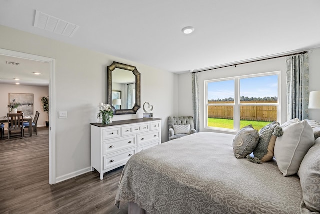 bedroom featuring dark hardwood / wood-style floors