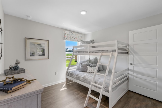 bedroom featuring dark wood-type flooring