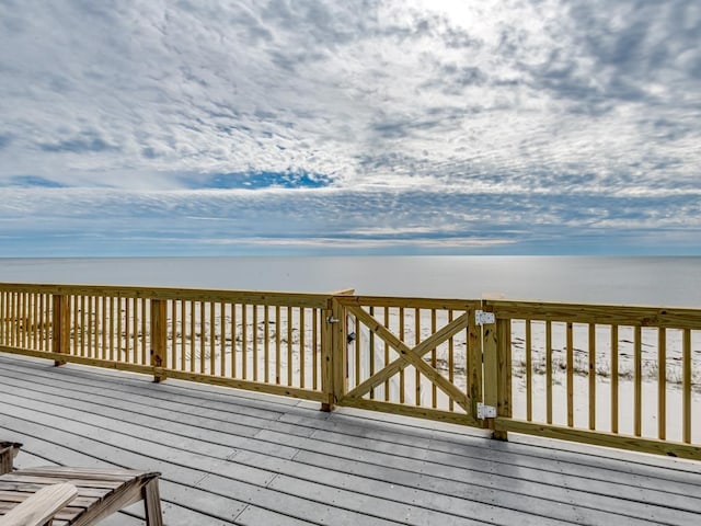 wooden terrace with a water view