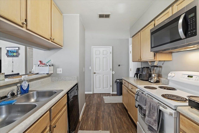 kitchen with white electric range, stainless steel microwave, light countertops, and visible vents