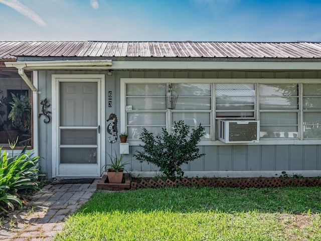 6 Parker Ave Unit 3 & 4, Lanark Village, FL 32323 - entrance to property with a metal roof and cooling unit