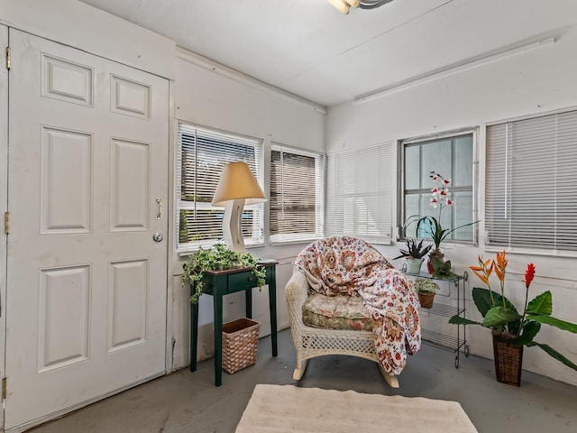 6 Parker Ave Unit 3 & 4, Lanark Village, FL 32323 - sitting room with concrete flooring