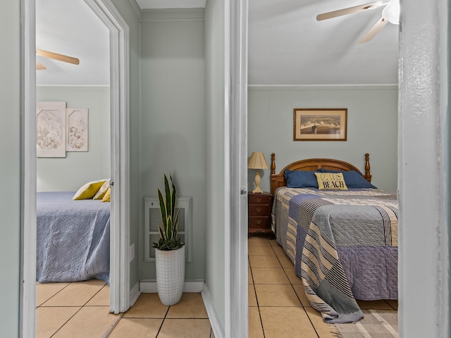 6 Parker Ave Unit 3 & 4, Lanark Village, FL 32323 - bedroom with light tile patterned flooring, ornamental molding, and ceiling fan