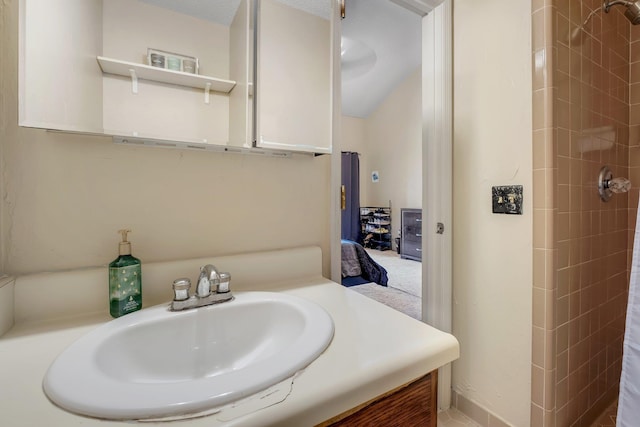 bathroom featuring vanity and a shower with shower curtain