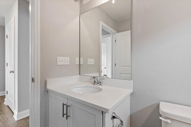 3745 Meadow Vista Ln, Tallahassee, FL 32308 - half bathroom featuring vanity and wood finished floors