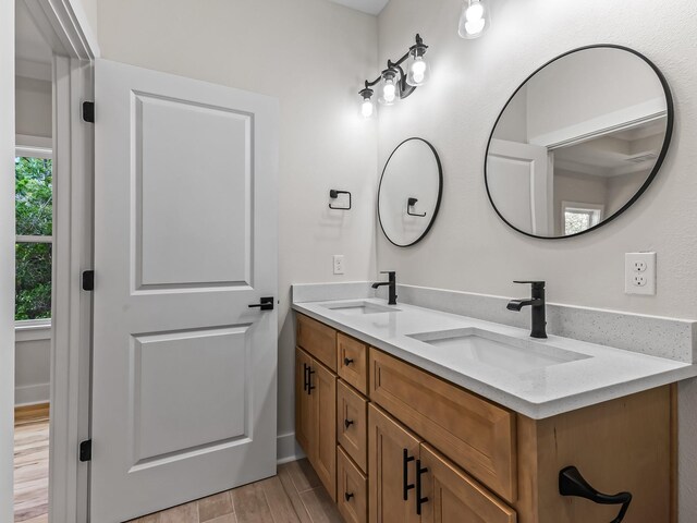 117 Anhinga Trl, Carrabelle, FL 32322 - full bath with double vanity and wood finished floors