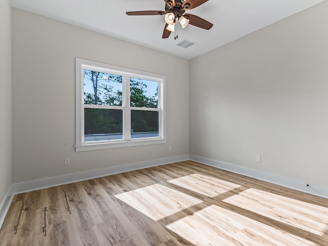 117 Anhinga Trl, Carrabelle, FL 32322 - unfurnished room featuring a ceiling fan and wood finished floors