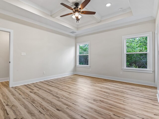 117 Anhinga Trl, Carrabelle, FL 32322 - spare room featuring light wood finished floors, beam ceiling, coffered ceiling, a ceiling fan, and recessed lighting