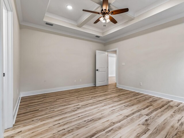 117 Anhinga Trl, Carrabelle, FL 32322 - spare room featuring light wood-style floors, ceiling fan, beamed ceiling, coffered ceiling, and ornamental molding