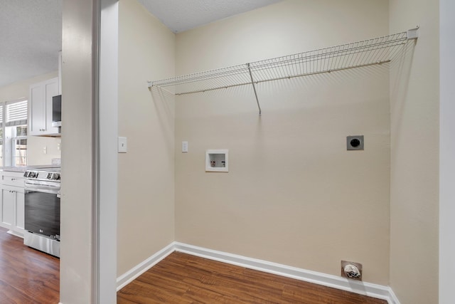 1790 Newman Ln, Tallahassee, FL 32312 - laundry room featuring hookup for an electric dryer, hookup for a washing machine, dark wood-style flooring, and baseboards