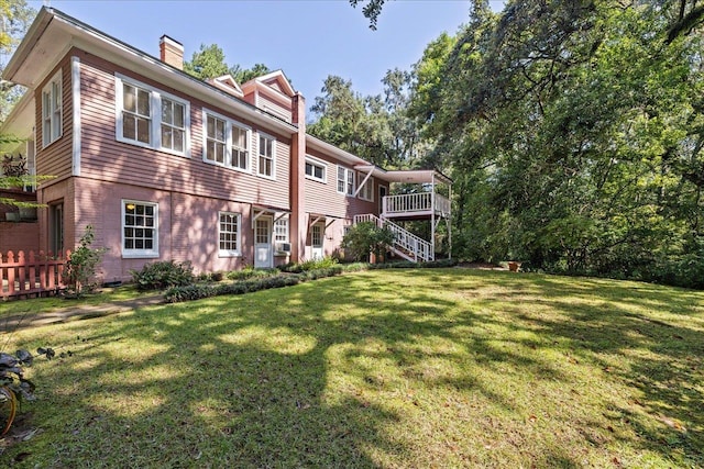 727 Miccosukee Rd -, Unit Tallahassee, FL 32308 - back of house with stairs and a chimney