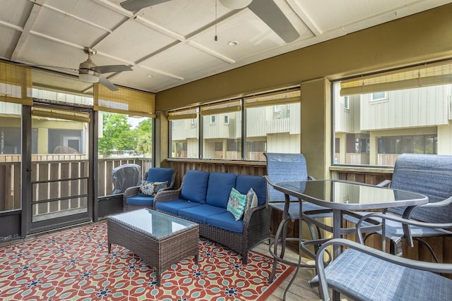377 Pirates Landing Dr, Carrabelle, FL 32320 - sunroom / solarium with an outdoor hangout area, outdoor dining area, and ceiling fan