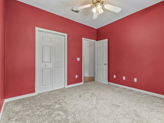 944 Poser Ct, Tallahassee, FL 32317 - unfurnished bedroom featuring carpet, a ceiling fan, and a closet