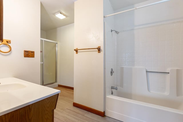 bathroom with vanity and hardwood / wood-style floors