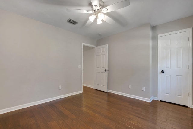 2953 Velda Dairy Rd, Tallahassee, FL 32309 - unfurnished bedroom with dark wood finished floors and a ceiling fan