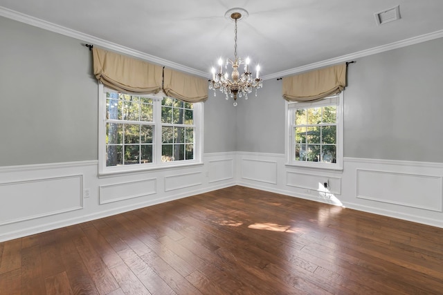 2953 Velda Dairy Rd, Tallahassee, FL 32309 - spare room featuring a chandelier, a wainscoted wall, hardwood / wood-style floors, and crown molding