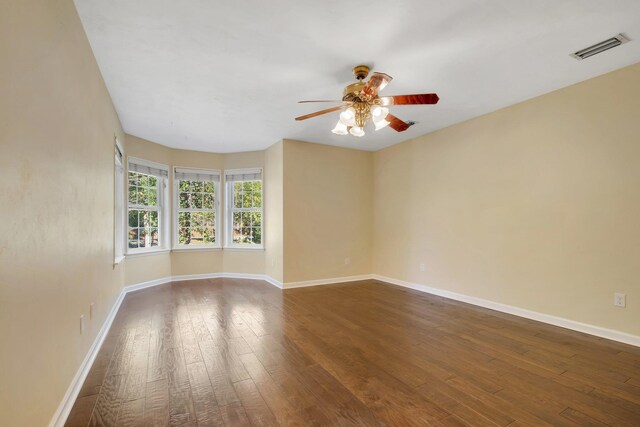 2953 Velda Dairy Rd, Tallahassee, FL 32309 - unfurnished room with ceiling fan and dark wood-style flooring