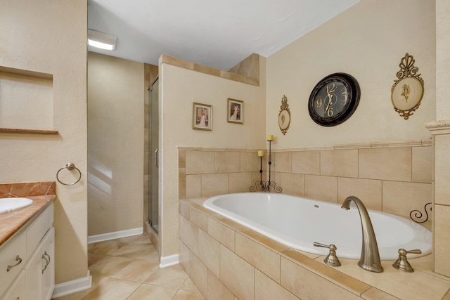 2953 Velda Dairy Rd, Tallahassee, FL 32309 - full bath with vanity, a shower stall, a bath, and tile patterned floors