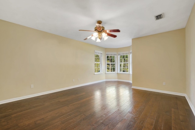 2953 Velda Dairy Rd, Tallahassee, FL 32309 - empty room with a ceiling fan and dark wood finished floors