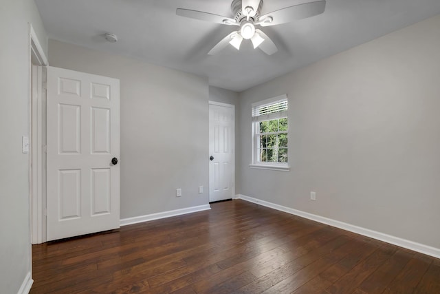2953 Velda Dairy Rd, Tallahassee, FL 32309 - unfurnished bedroom featuring dark wood finished floors, ceiling fan, and a closet