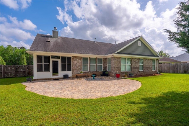 4516 Cavendish Ct, Tallahassee, FL 32309 - back of house with a patio, a fenced backyard, a chimney, and brick siding