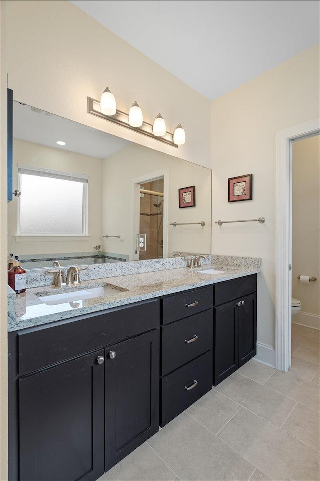 4516 Cavendish Ct, Tallahassee, FL 32309 - full bathroom featuring double vanity and tile patterned flooring