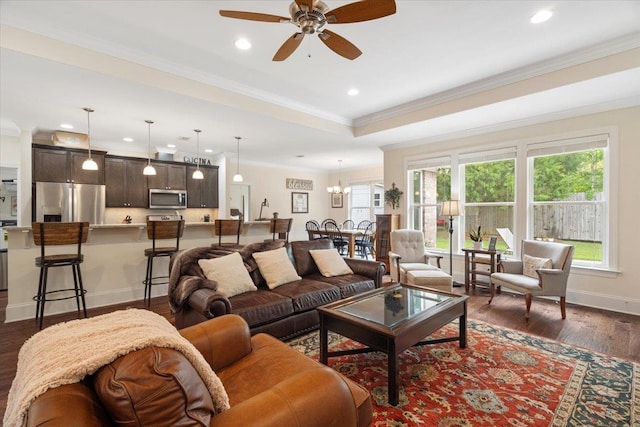 4516 Cavendish Ct, Tallahassee, FL 32309 - living area with a ceiling fan, dark wood-style flooring, recessed lighting, crown molding, and a chandelier