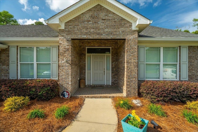 4516 Cavendish Ct, Tallahassee, FL 32309 - property entrance with brick siding and a shingled roof